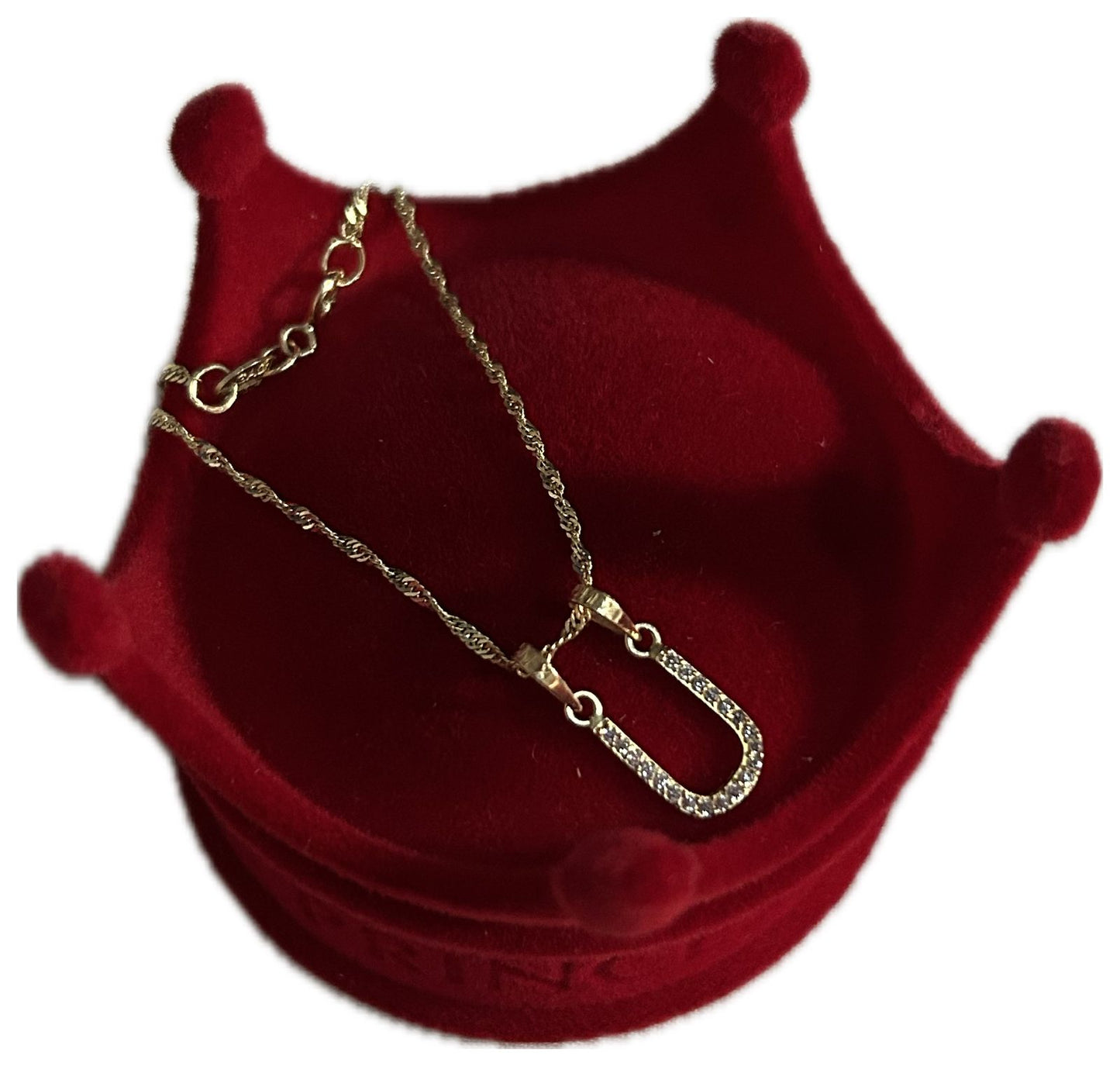 DIJE/PENDIENTE DE LETRA CON ZIRCONIA Y CADENA 10K "U"